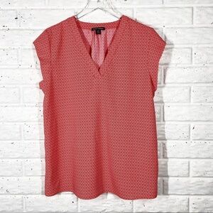 HILARY RADLEY Coral color patterned blouse with cap sleeves